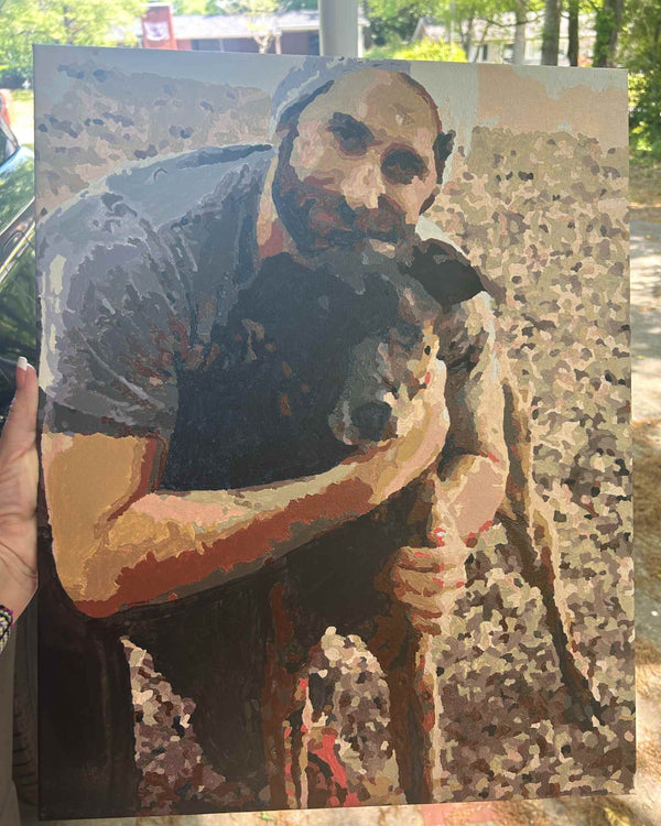 Custom paint by numbers made from Brandi D's own photo: a man holding a small dog in his arms