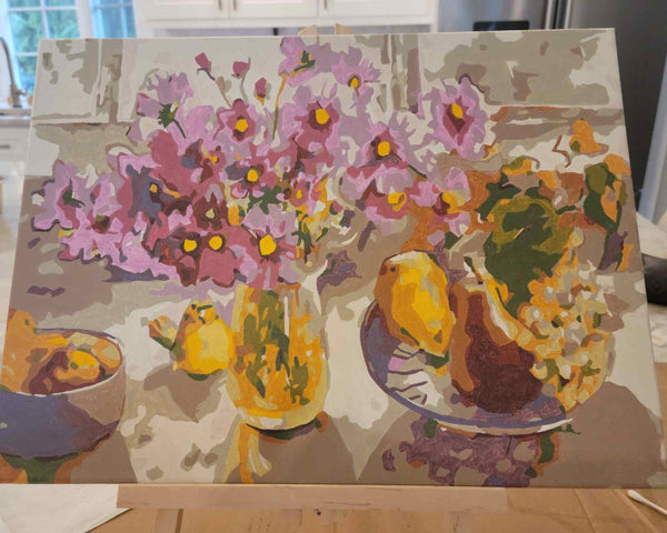 Cosmos from the Garden paint by numbers completed by Carol S: pink cosmos in a glass vase beside pears and grapes