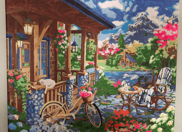 Colorful House Near the Lake paint by numbers completed by Frank S: a flower-filled porch above a mountain lake