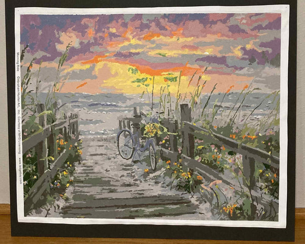 Morning Ride paint by numbers completed by Debra: a bicycle leaning on a fence at the top of a beach path at sunrise