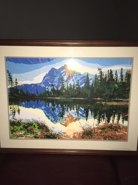 Paint by numbers completed by Guy: a mountain reflected in a still lake, framed