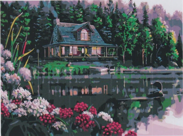 Still Waters paint by numbers completed by Henry: a lit log cabin and a loon on a still northern lake