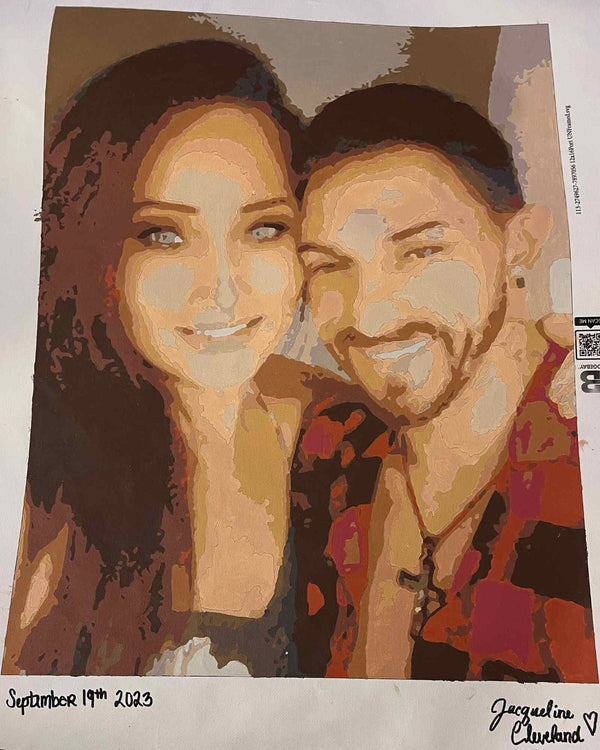 Custom paint by numbers made from Jacqueline C's own photo: a portrait of a couple close together, dated by the painter