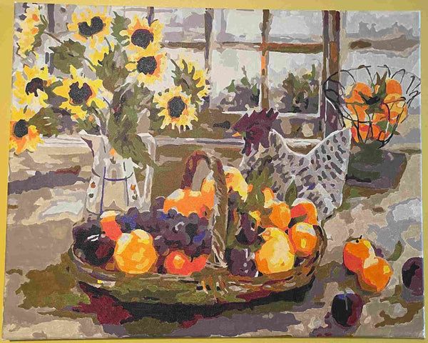 Paint by numbers completed by Kathleen M: sunflowers beside a basket of autumn fruit