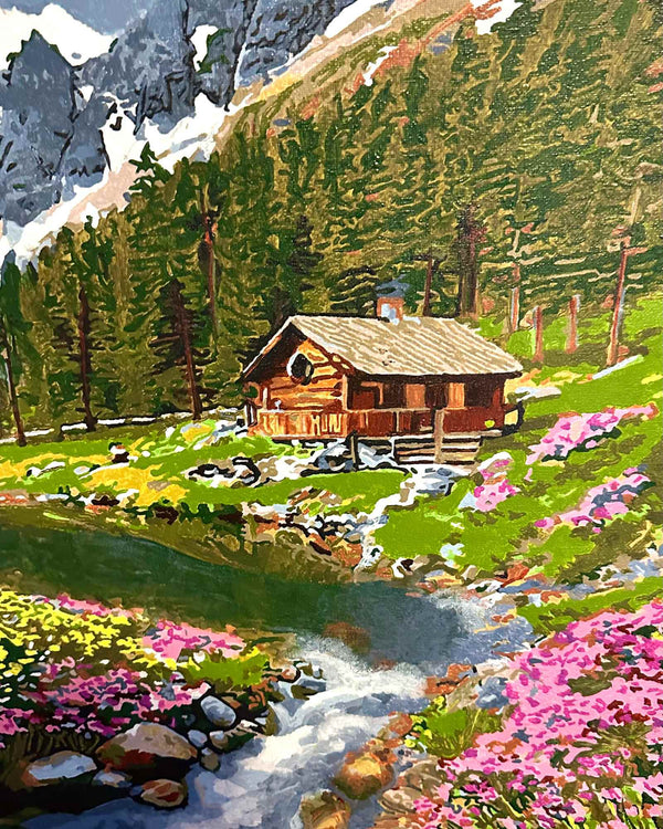 Paint by numbers completed by Leah S: an alpine chalet beside a stream lined with pink flowers