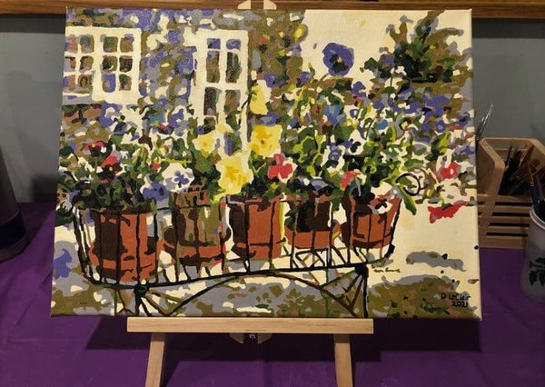 Rita's Pansies paint by numbers completed by Donna L: pansies in terracotta pots on a garden cart