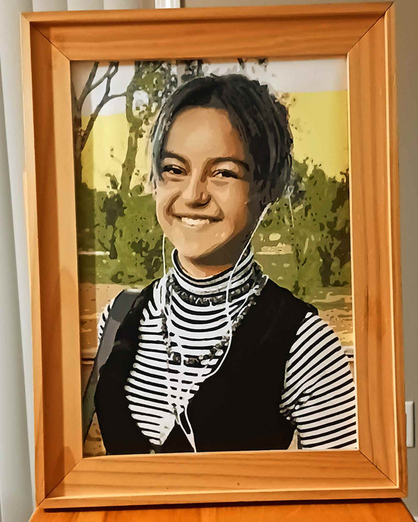 Custom paint by numbers made from Sandi K's own photo: a framed portrait of a young woman smiling