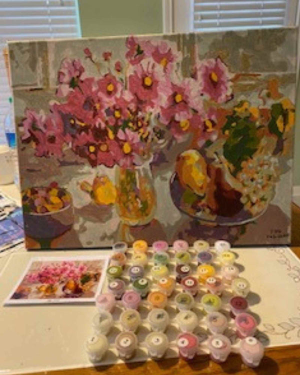 Cosmos from the Garden paint by numbers completed by Pam D: pink cosmos in a glass vase beside pears and grapes