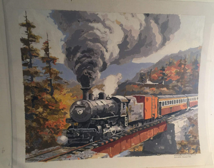 Paint by numbers completed by William P: a steam locomotive crossing a bridge among autumn trees