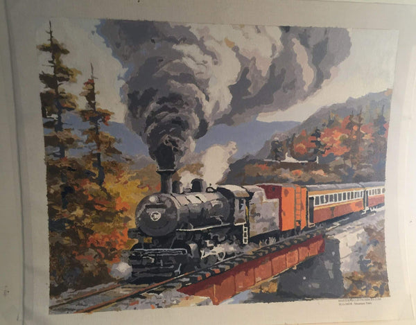 Paint by numbers completed by William P: a steam locomotive crossing a bridge among autumn trees