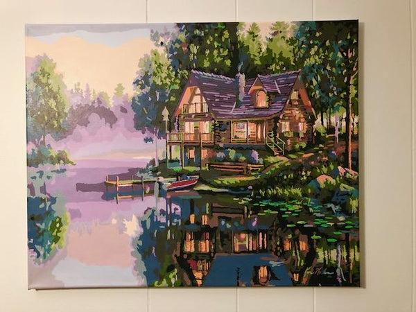 Paint by numbers completed by Brandie F: a lakeside house reflected in still water
